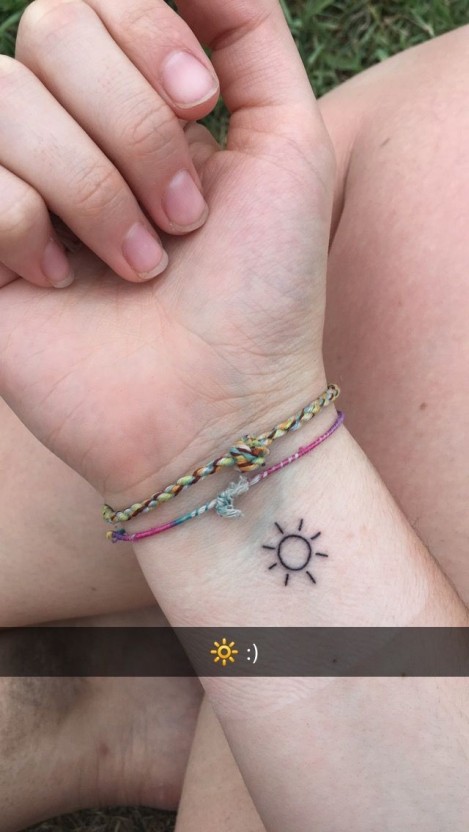 Small sun tattoo 0023