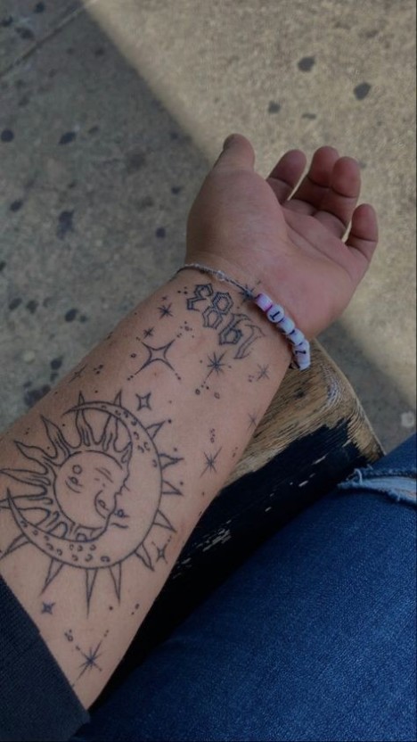 Small sun tattoo 0024