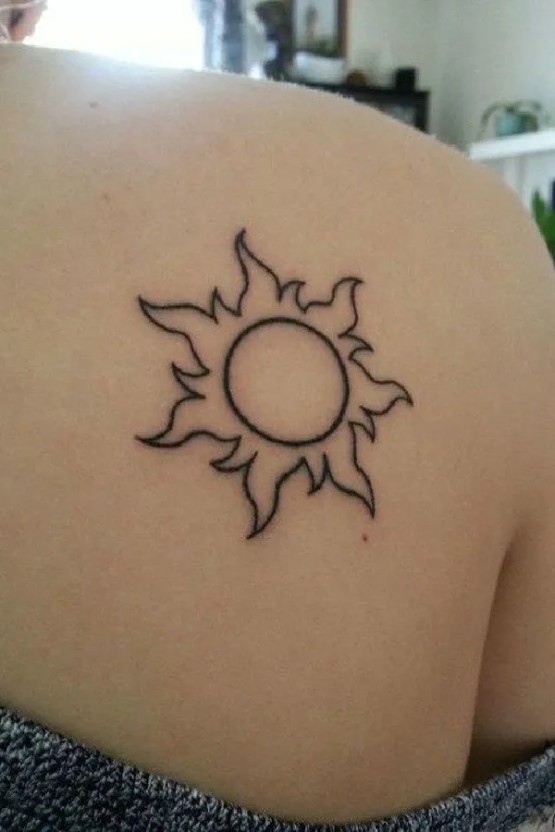 Small sun tattoo 0031