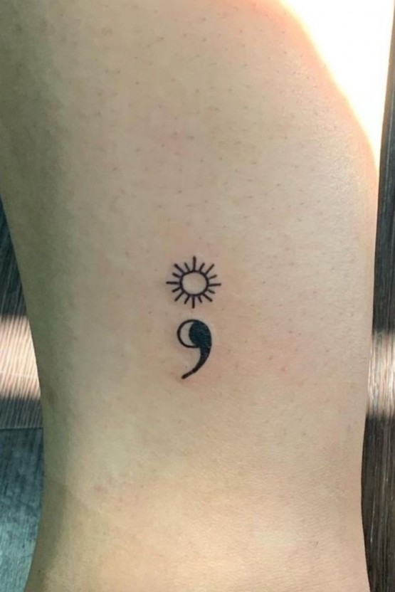 Small sun tattoo 0032