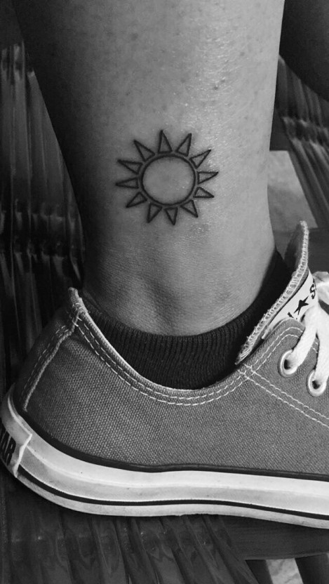 Small sun tattoo 0033