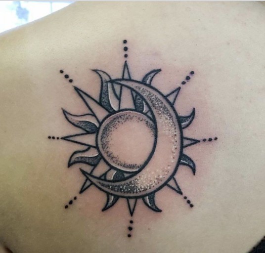 Small sun tattoo 0036