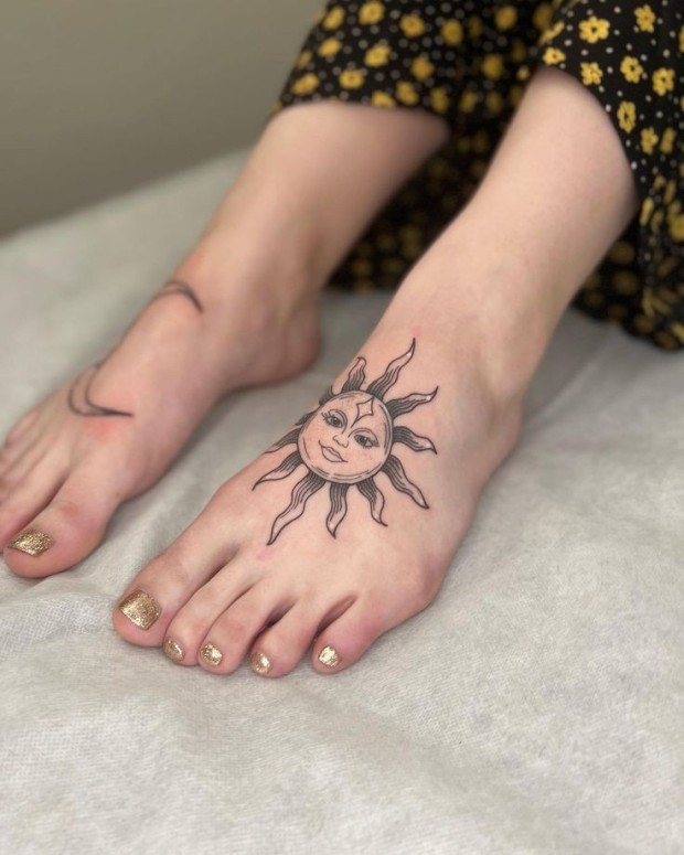 Small sun tattoo 0042