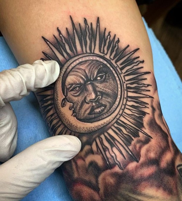 Small sun tattoo 0043