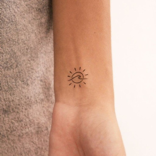 Small sun tattoo 0045