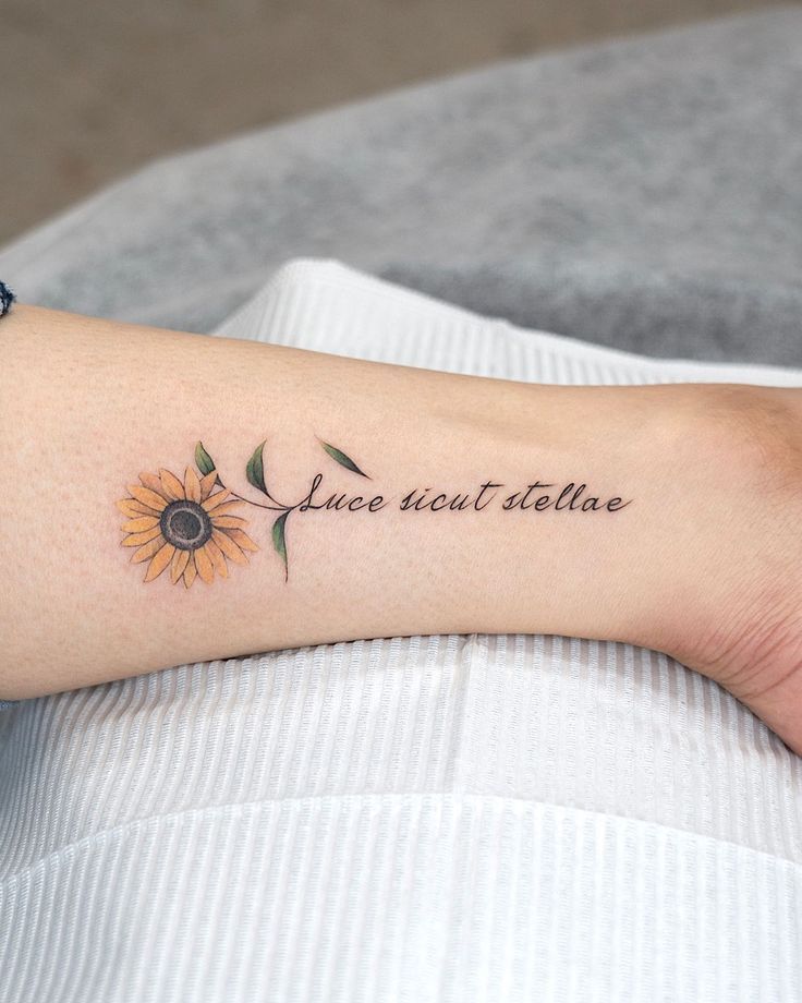 Small sunflower tattoo