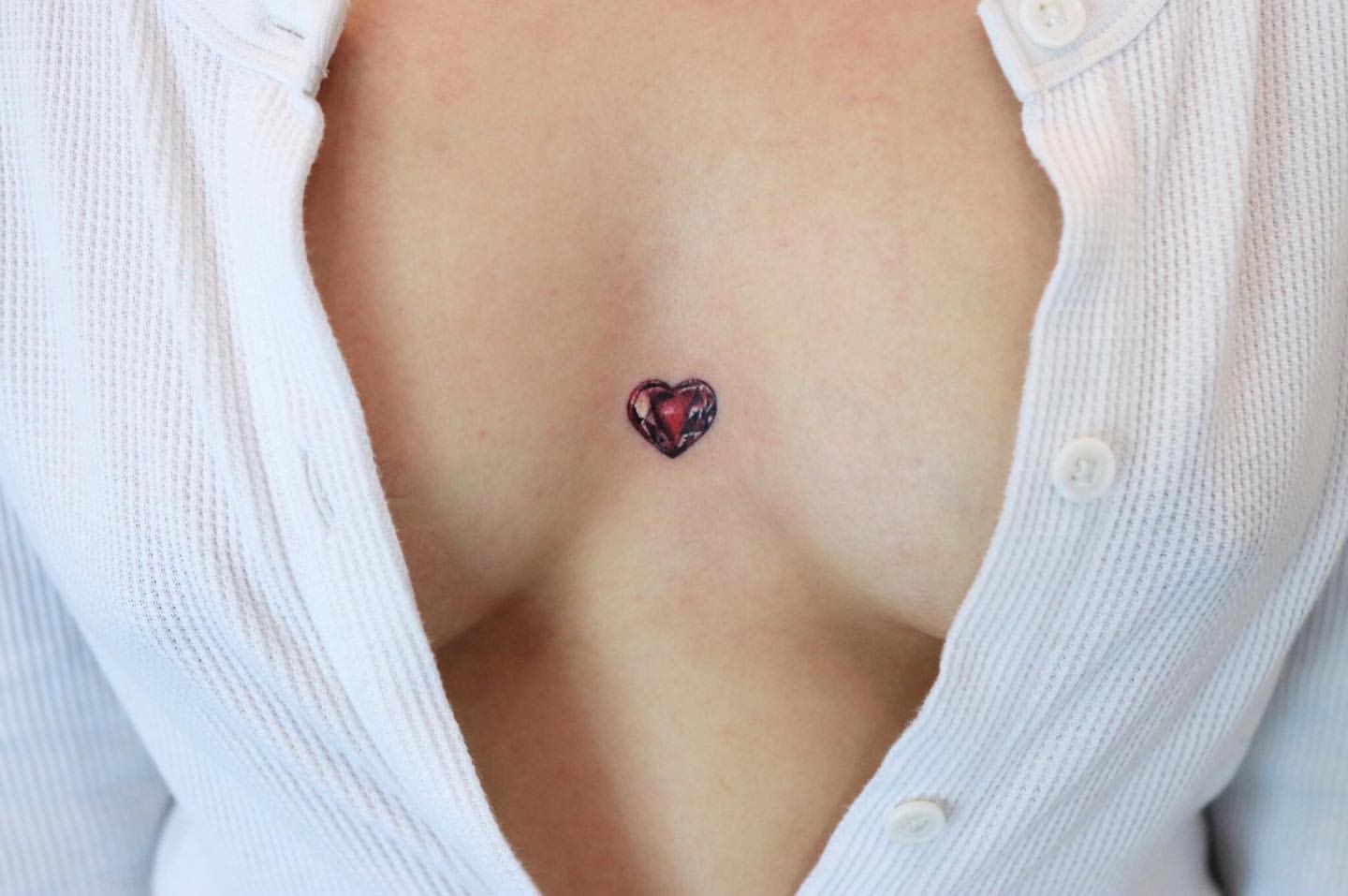 small tattoo on chest girl 0011