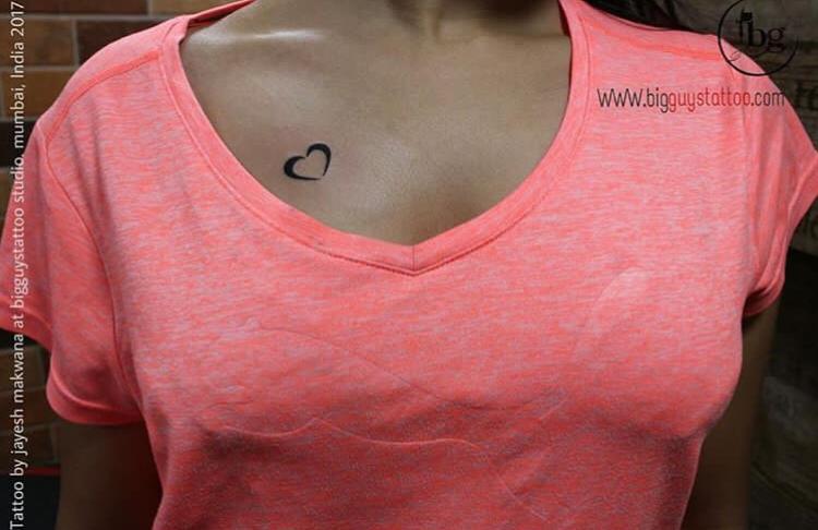 small tattoo on chest girl 0031