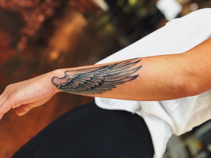 small wing tattoo on forearm ideas