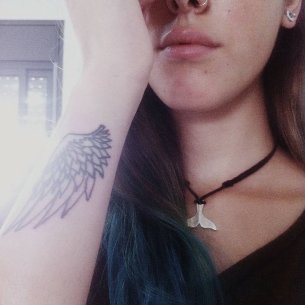 small wing tattoo on forearm 0010