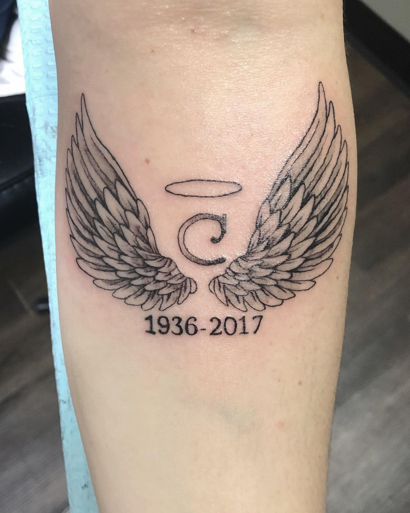 small wing tattoo on forearm 0022