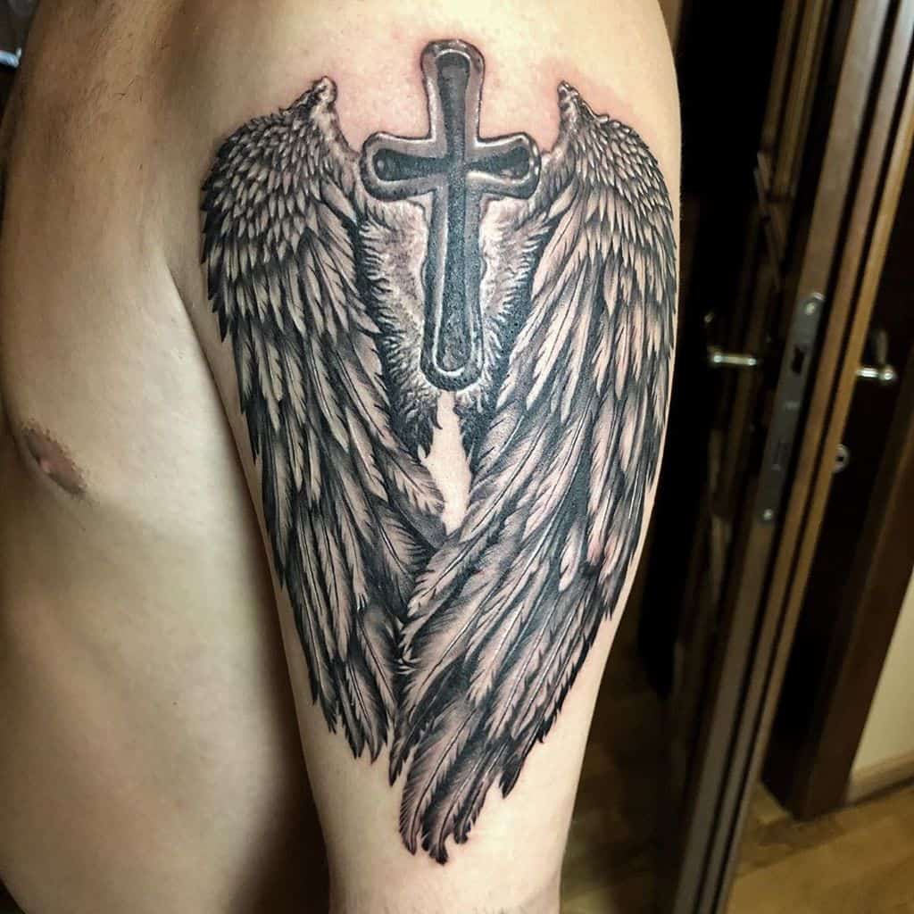 small wing tattoo on forearm 0023