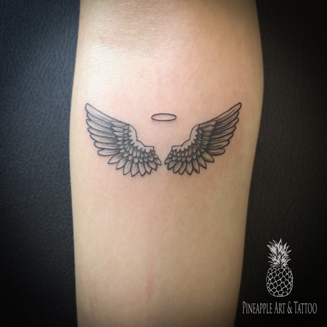 small wing tattoo on forearm 0026