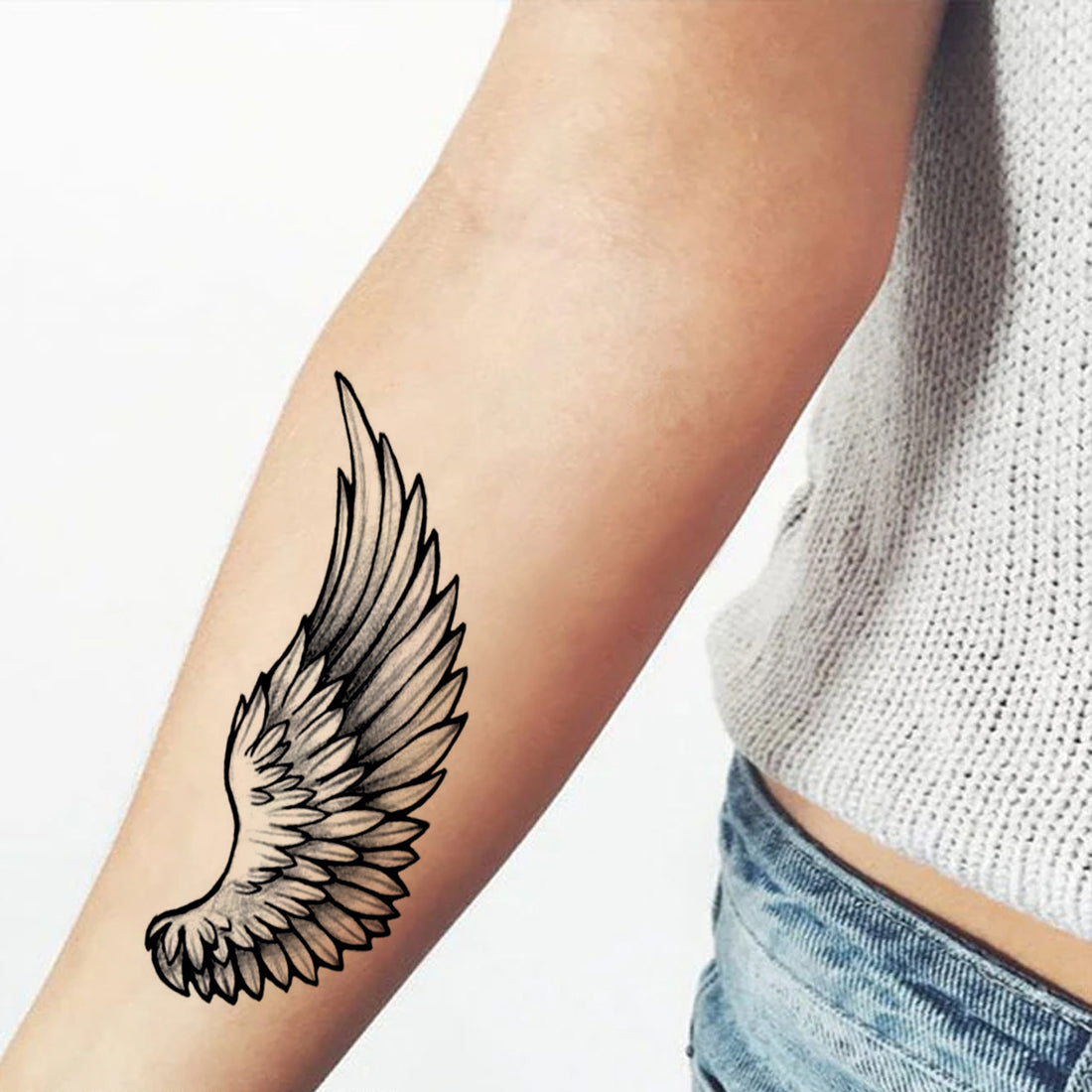 small wing tattoo on forearm 0027