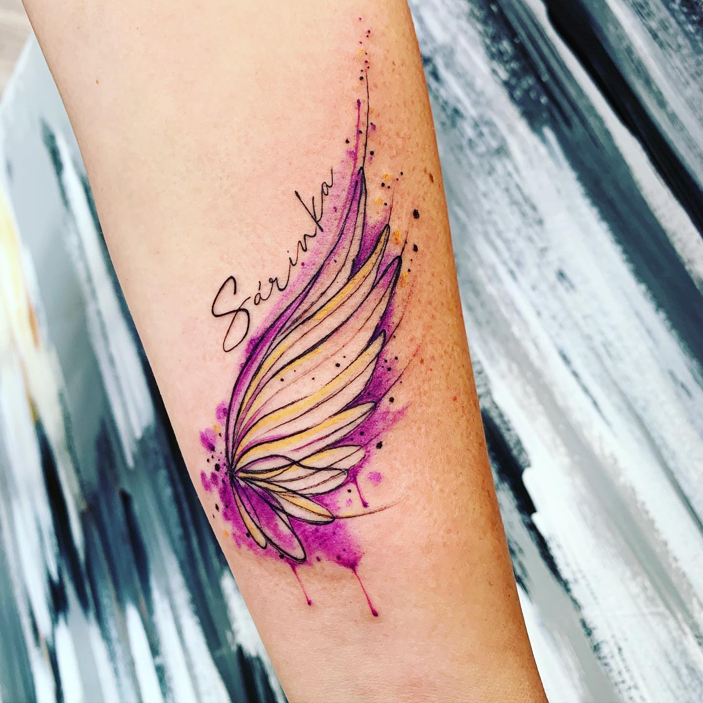 small wing tattoo on forearm 0031