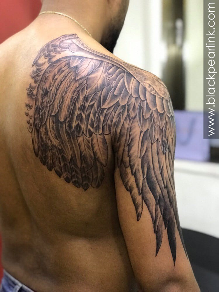 small wing tattoo on forearm 0033