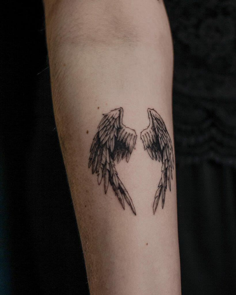 small wing tattoo on forearm 0060