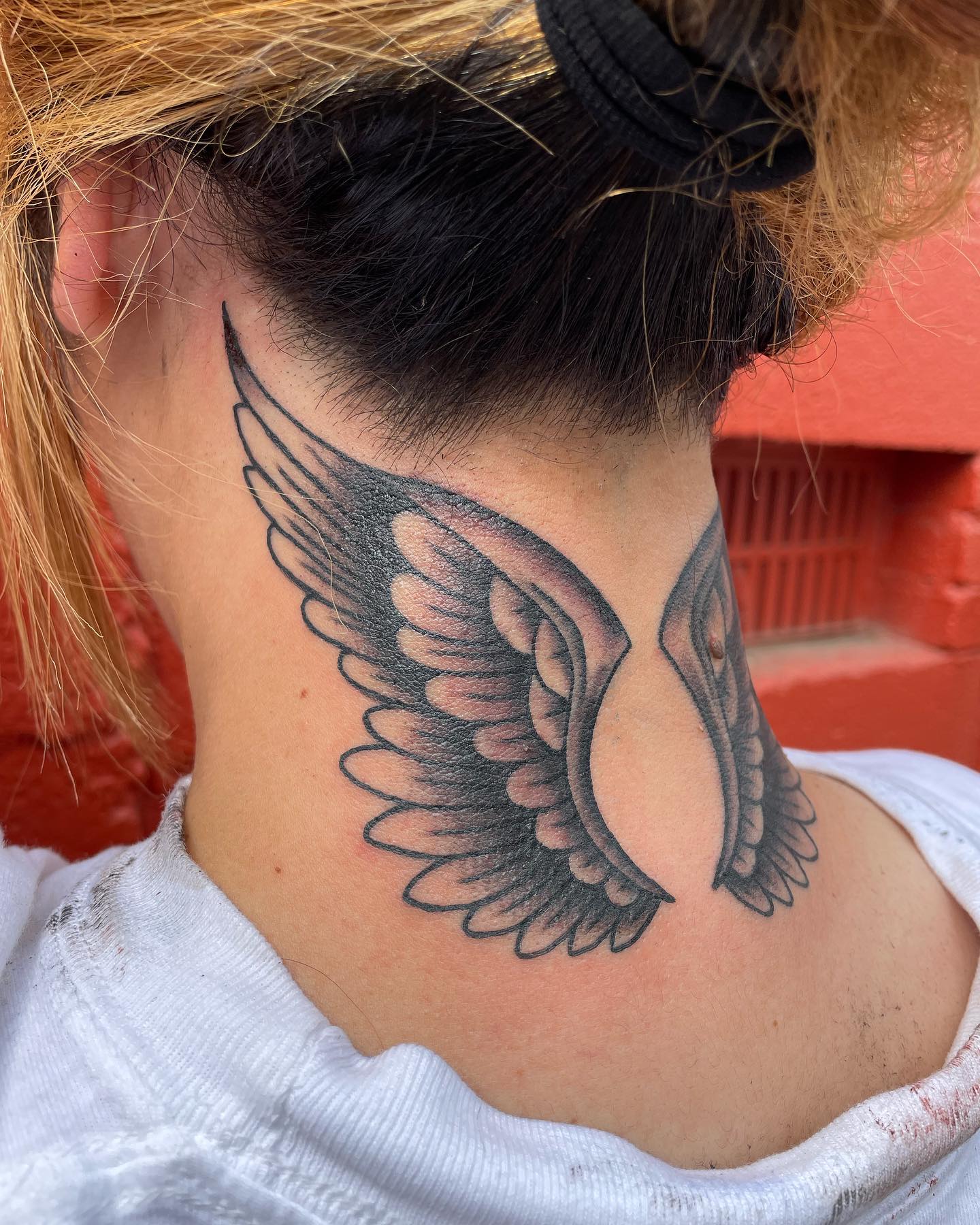 small wing tattoo on forearm 0082