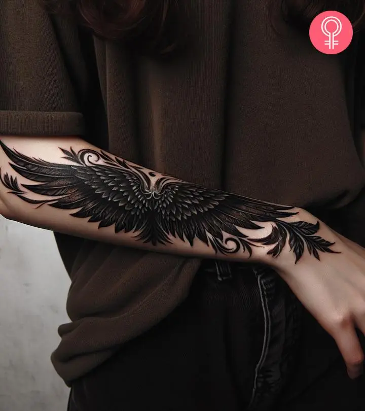 small wing tattoo on forearm 0083