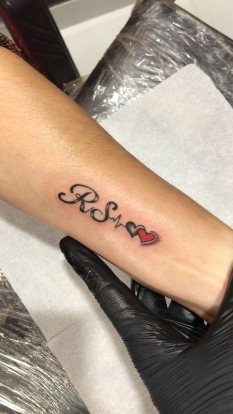 stylish letter tattoo ideas for wrist placements