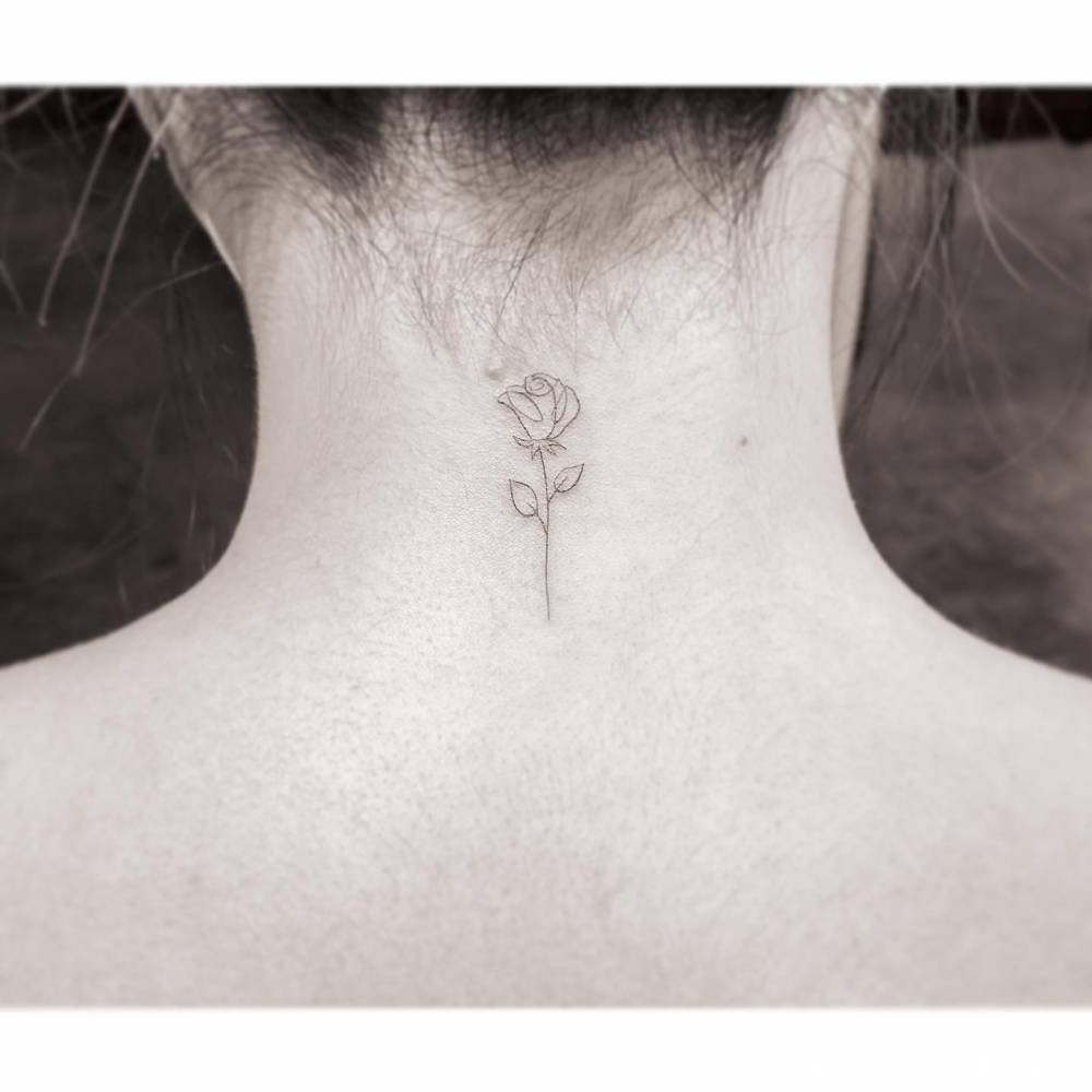 stylish small rose neck tattoo placements.