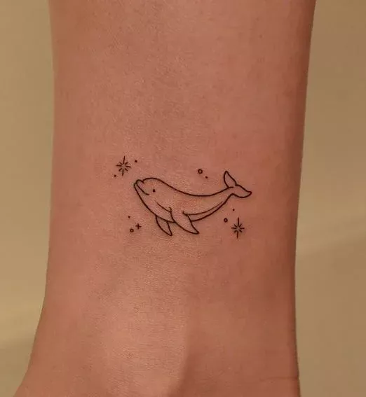 subtle dolphin tattoo ideas for delicate placements