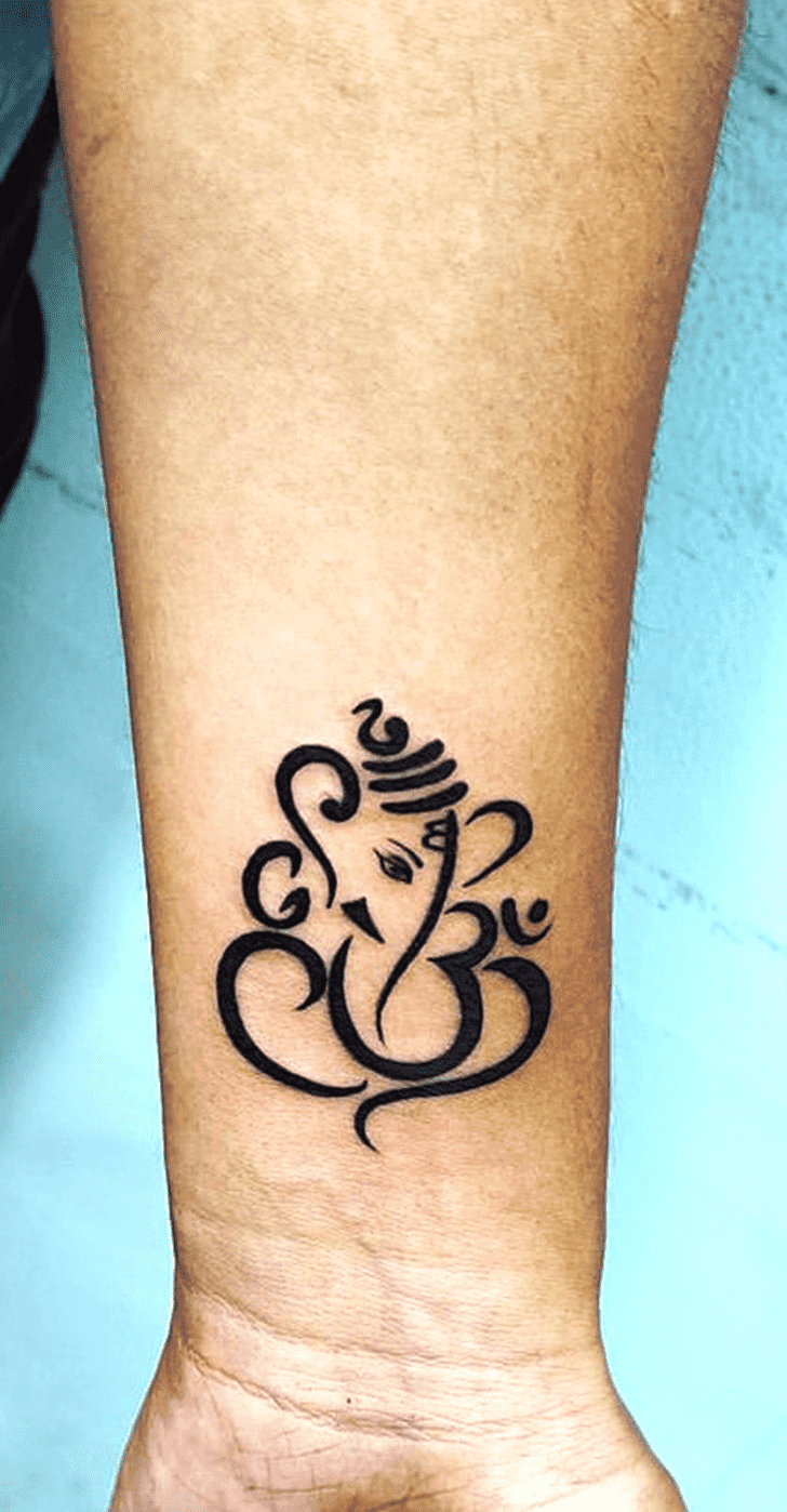 subtle Ganesha tattoo ideas for women