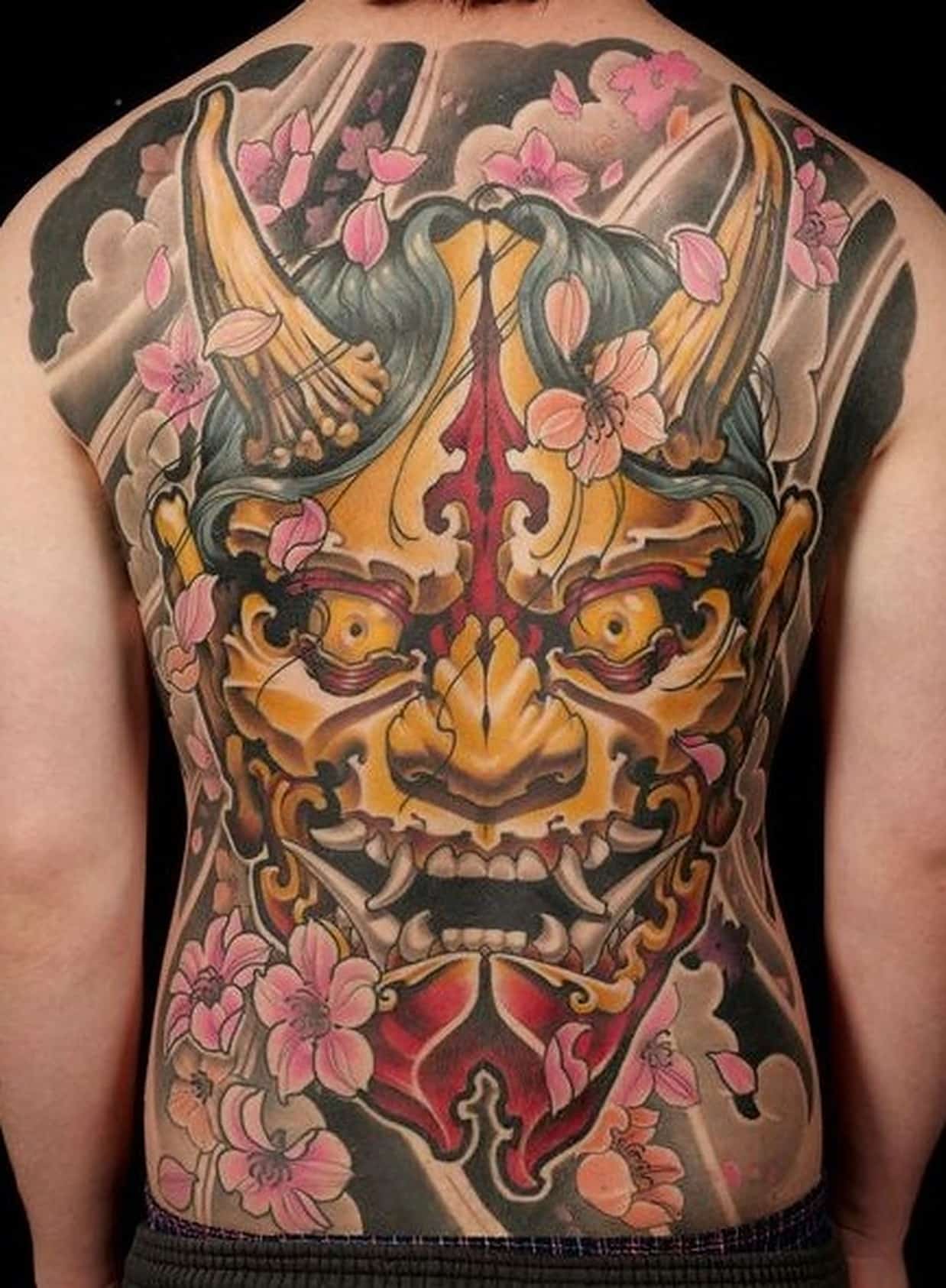 tattoo ideas woman face upside down oni face tattoo 0010