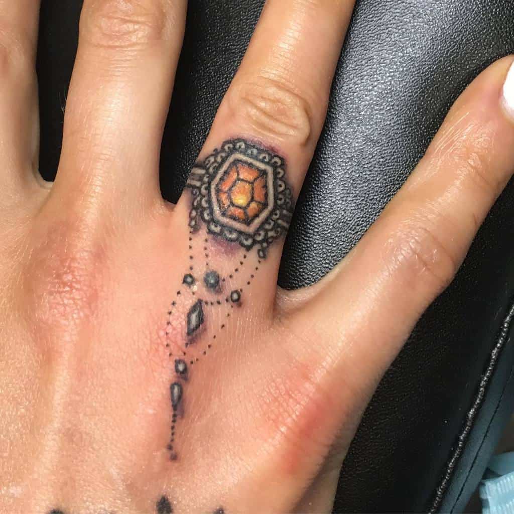 tattoos on ring finger ideas 0033