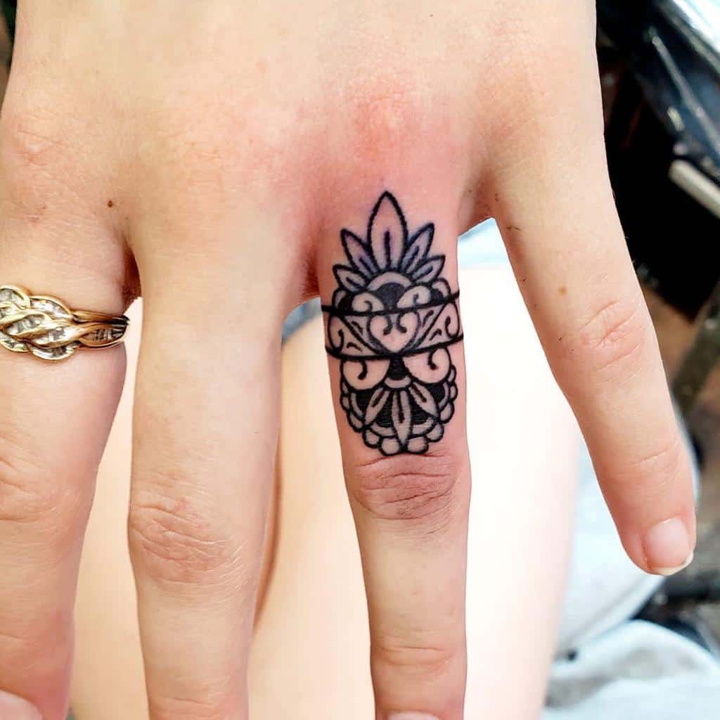 tattoos on ring finger ideas 0059