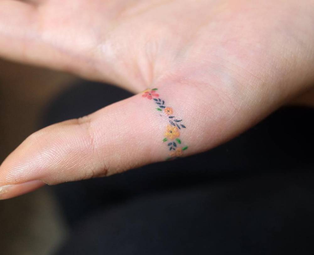 tattoos on ring finger ideas 0066