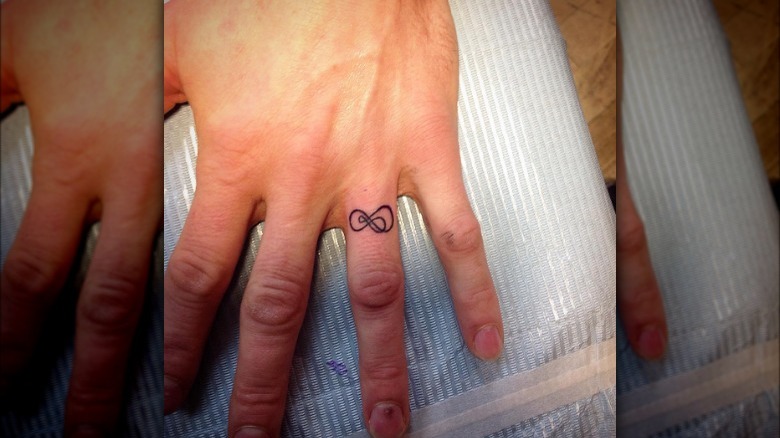 tattoos on ring finger ideas 0067