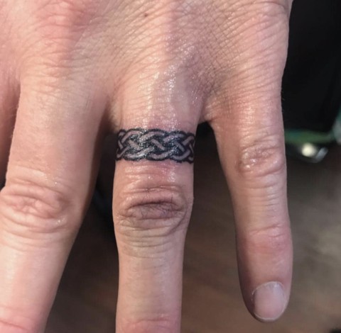 trendy ring tattoo options.