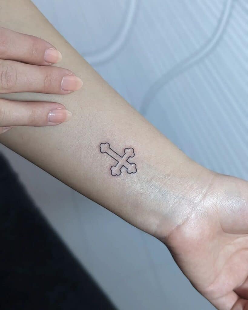 trendy small cross wrist tattoos