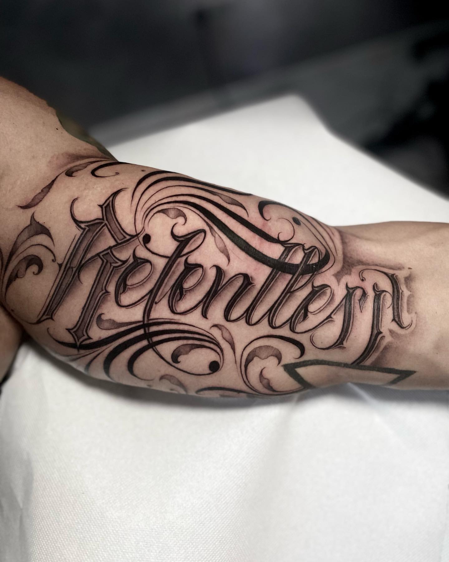 unique inner bicep tattoo ideas