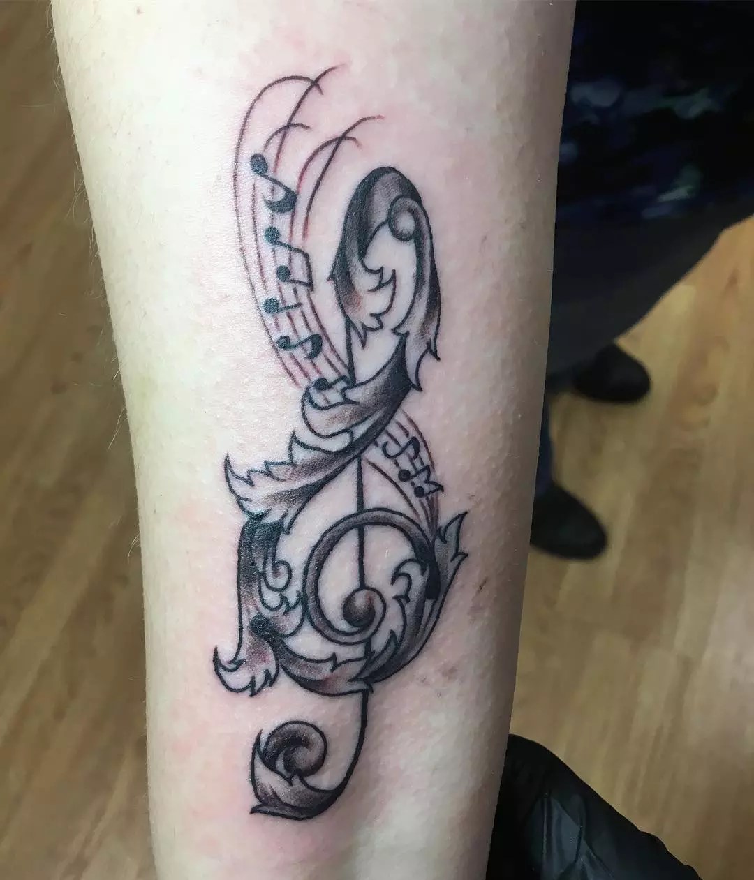 unique music notes tattoo ideas