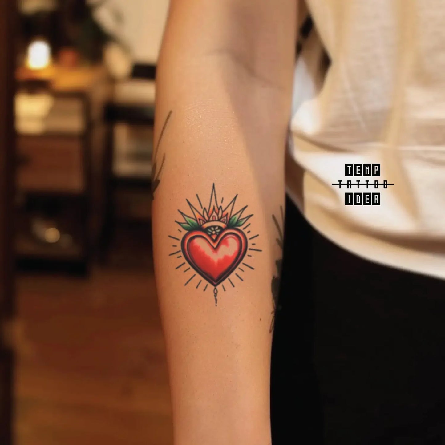 unique sacred heart tattoo expression