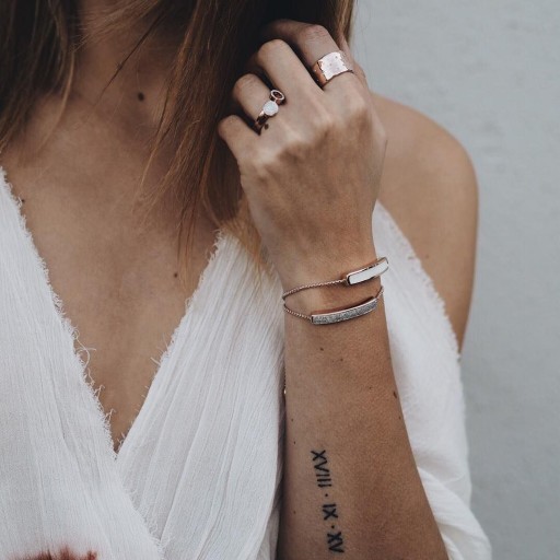 unique small date of birth tattoo inspiration