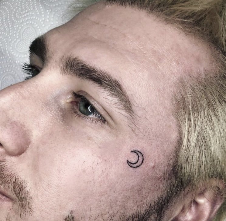 unique small face tattoo designs for men