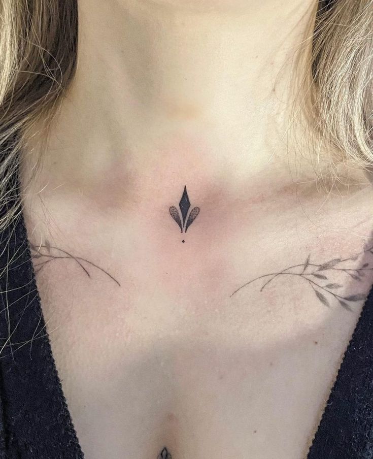 unique small female front neck tattoo ideas