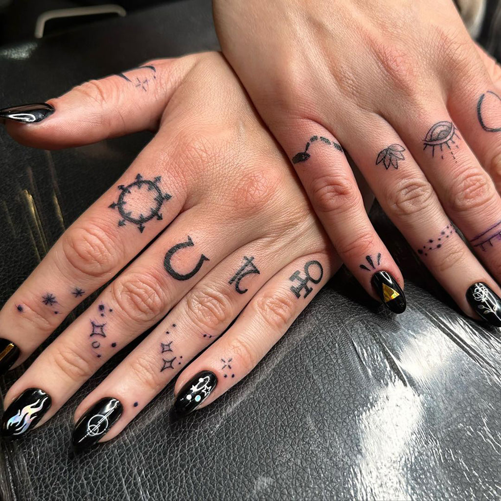 unique small finger tattoo ideas for women