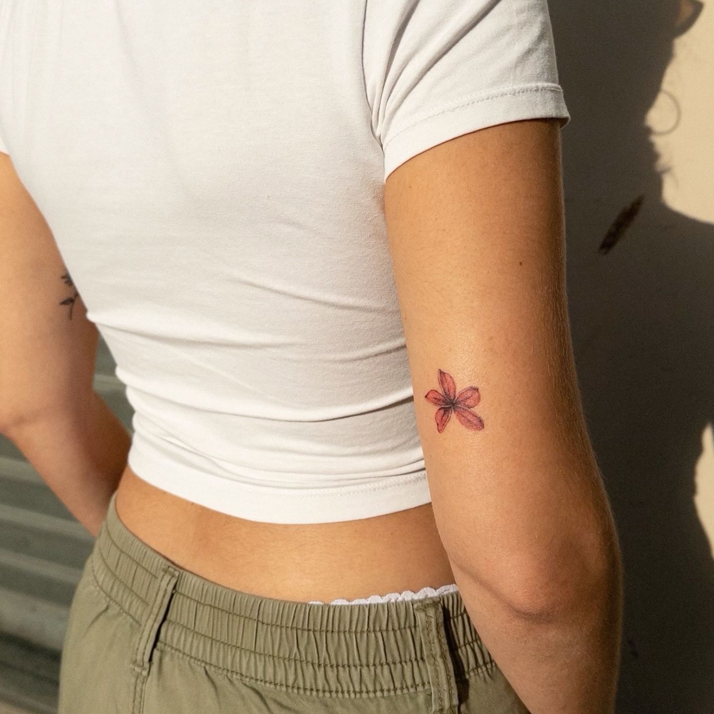 unique small plumeria tattoo inspirations