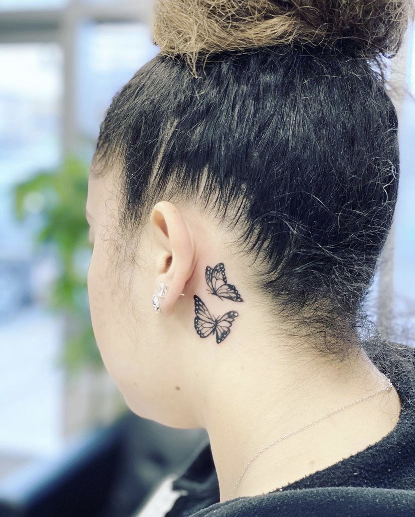 unique small side neck tattoos for women