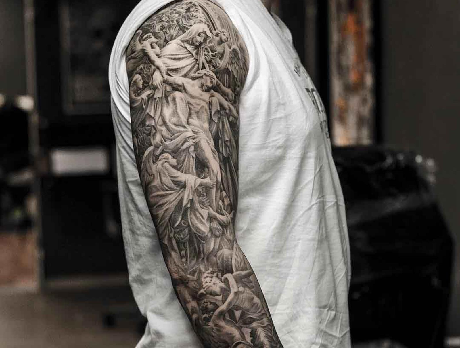 upper sleeve tattoo ideas for black men 0062