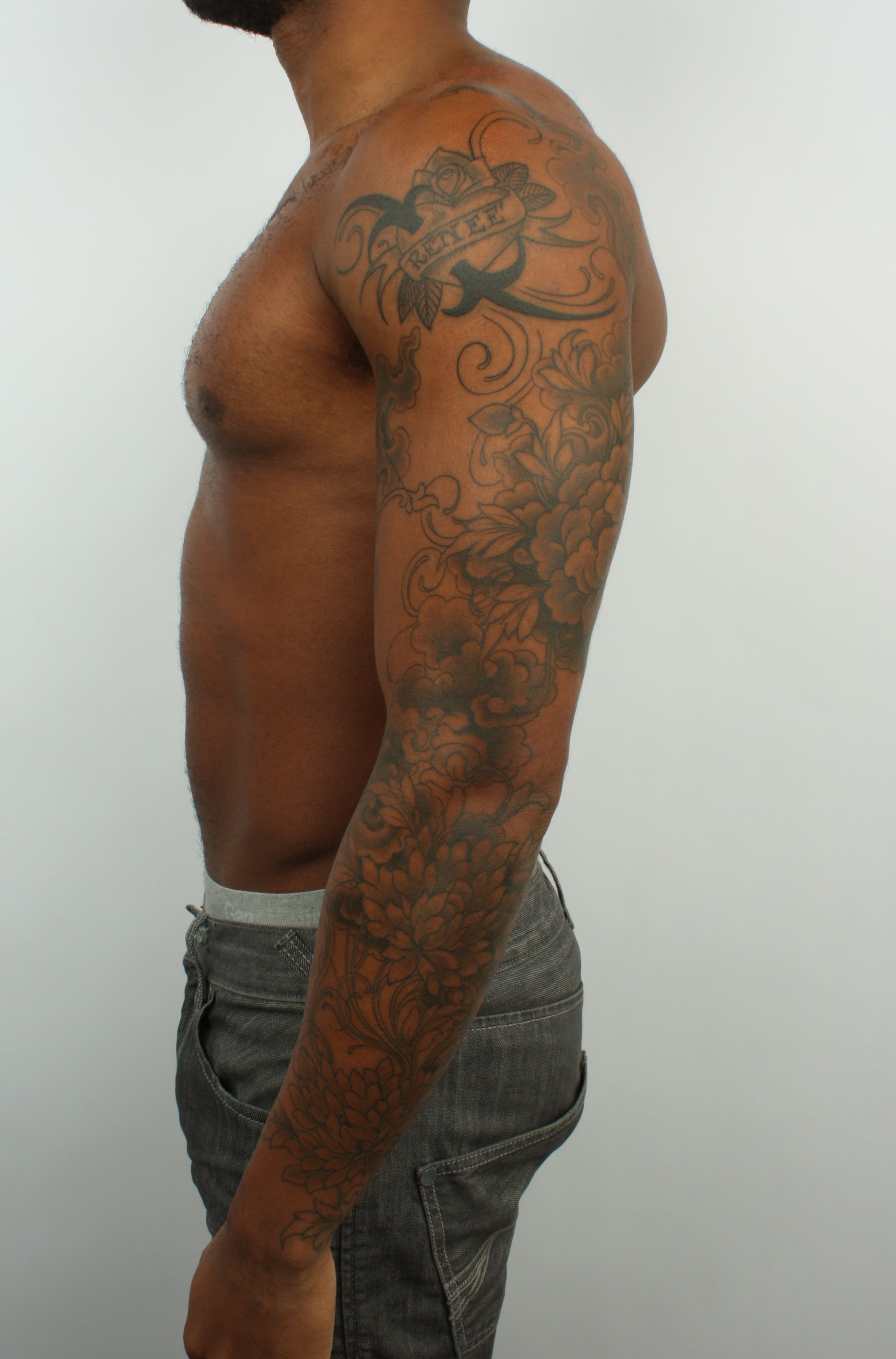 upper sleeve tattoo ideas for black men 0090