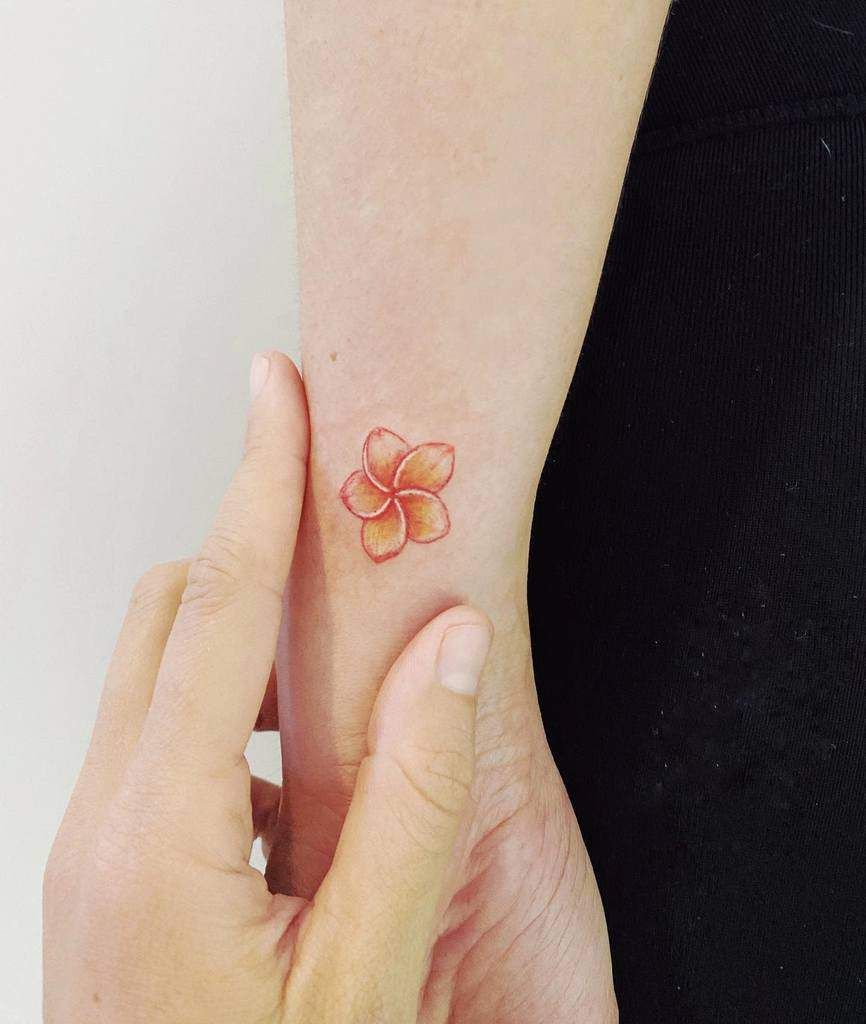 vibrant small plumeria tattoo colors