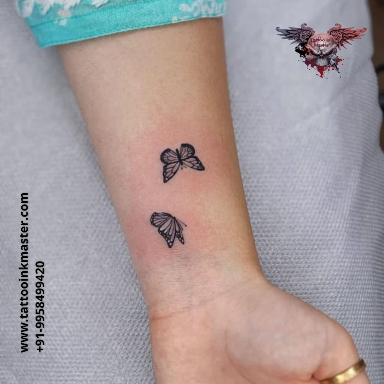 wrist small butterfly tattoo 0037