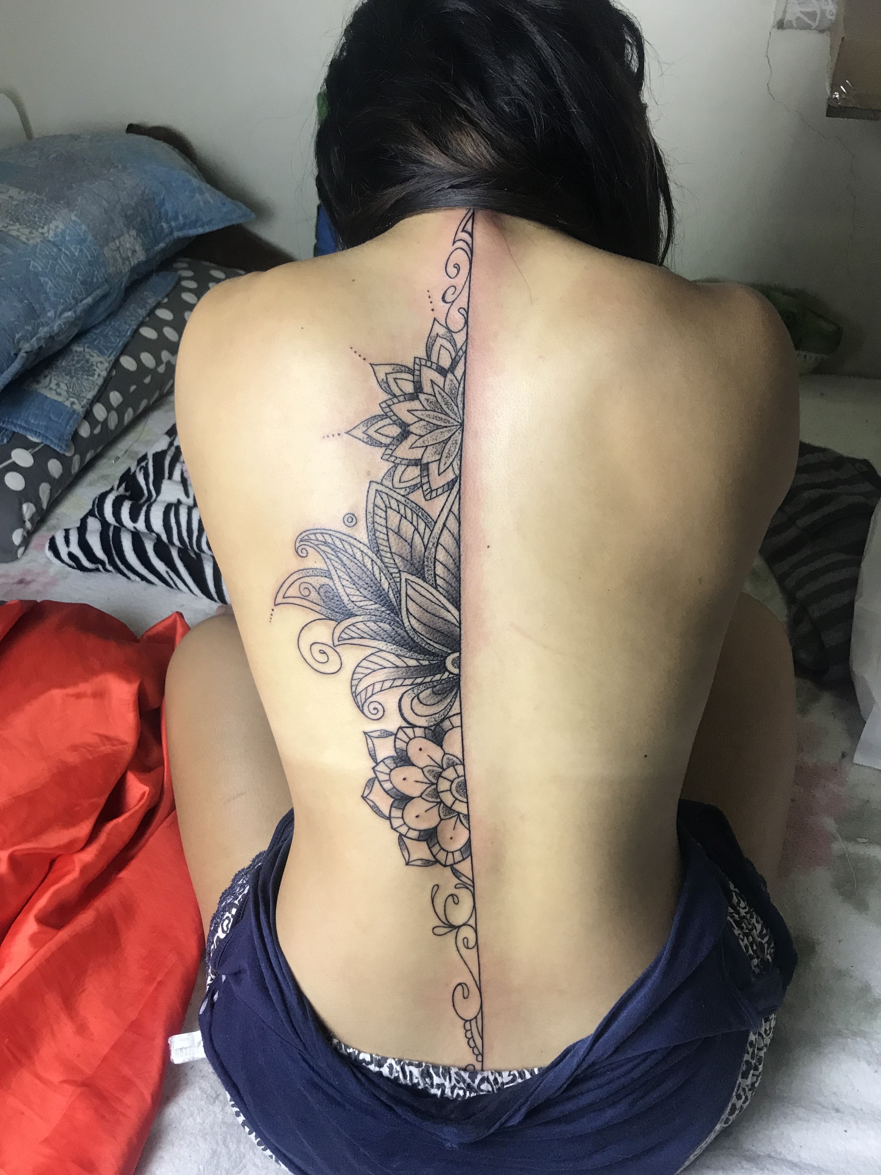 Back tattoo ideas for women that symbolize strength and individuality