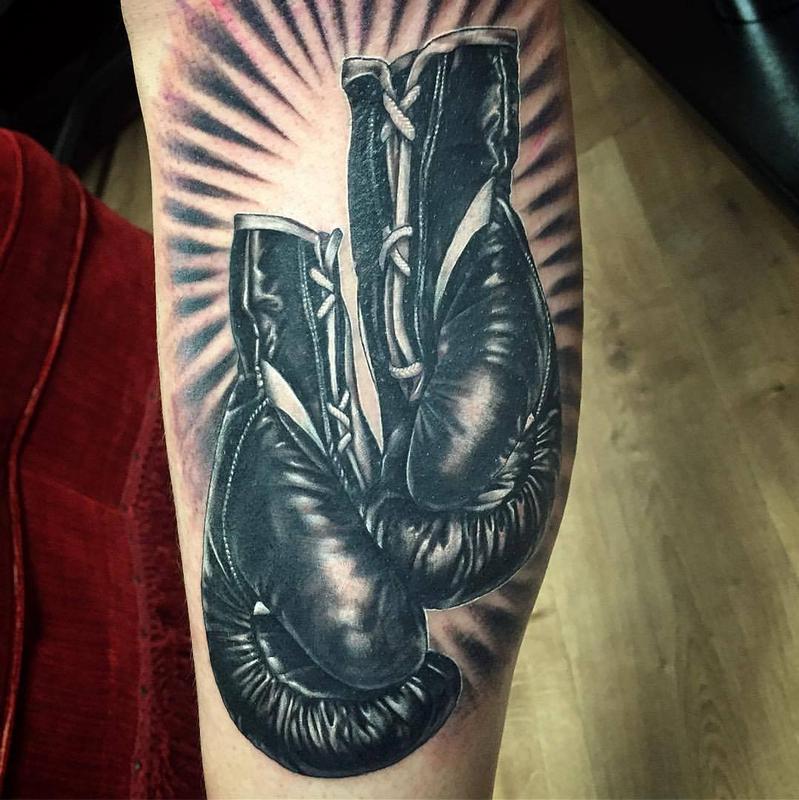 Illustrated boxing gloves tattoo ideas to represent your fighting spirit