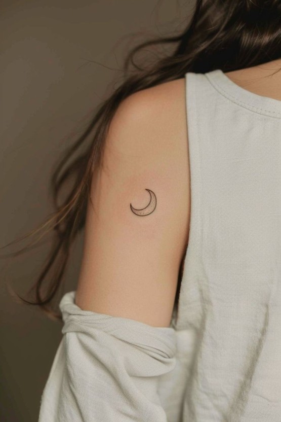 Crescent moon tattoo ideas that showcase engraved elegance and style